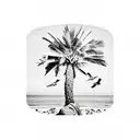 palm tree on an island with a young lady lay down and song bird flying around tattoo design idea