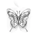 A tattoo of a butterfly made up of country music lyrics and a wine glass tattoo design idea