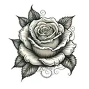 DC letter with rose surrounded tattoo design idea