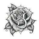 DC letter with rose surrounded tattoo design idea