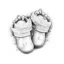 baby feet with the name JOY tattoo design idea