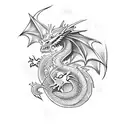 dragon surrounding a garnet gemstone tattoo design idea