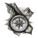 compass and mountains tattoo design idea