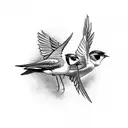 two swallows in flight tattoo design idea