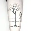 dead tree and man figure standing, palm towards the tree  tattoo design idea
