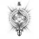 The tattoo consists of a light bulb approximately 4 inches long and realistic in style. Inside the bulb, there is a land tattoo design idea