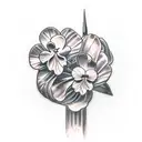 small violets around a dagger tattoo design idea