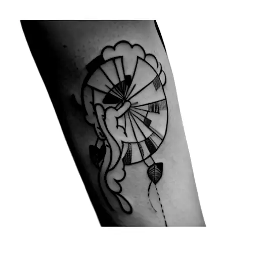 woman blowing wind tattoo design idea