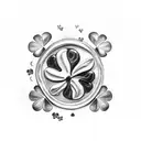 A pint of Guinness with a four-leaf clover floating on top tattoo design idea