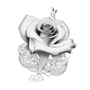 A cross intertwined with a rose vine tattoo design idea