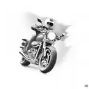 A motorcycle speeding through a dark cave, representing the thrill of the ride and the unknown tattoo design idea