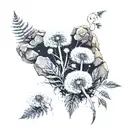 dandelions, ferns, and moss on rock tattoo design idea