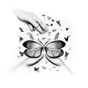 A makeup artist's hands holding a palette with colorful butterflies flying out of it tattoo design idea