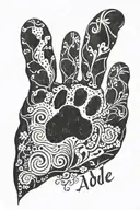 dog footprint that says Adele inside and has 1 eighth note on each side tattoo design idea