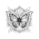 beautiful blue butterfly emerging from the skin lefted by a snake tattoo design idea