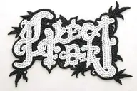 the word "Create" embroidered with thread and setting needle tattoo design idea