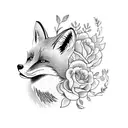 fox looking to the right with flowers coming out with the fox tattoo design idea
