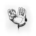 A blackwork tattoo of a police officer's hand holding a small animal, symbolizing loyalty and humility tattoo design idea