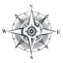 compass rose with a yin Yang in the middle tattoo design idea
