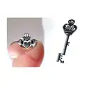 a claddagh ring and a key tattoo design idea