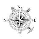 cracked compass tattoo design idea