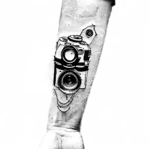 a tattoo of a camera tattoo design idea