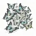 a group of small butterflies in flight moving in different directions. The effect of movement and dispersion tattoo design idea