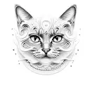 An intricate latte art design of a cat's face made with foamed milk tattoo design idea