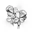 two touching irish shamrocks, one has sage and the other has rosemary tattoo design idea