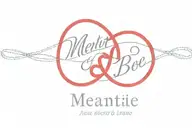 A fine line and dotted design of two intertwined red rope strings with the quote 'meant to be' in cursive  tattoo design idea