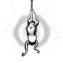A playful monkey swinging from a radiant sun tattoo design idea