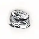 snake gets cut in half by a card tattoo design idea