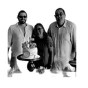 a group of people posing in front of a cake tattoo design idea