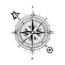 Compass stuck in sand 45dagree angle with shade tattoo design idea