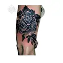 a peony and a snake tattoo design idea