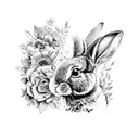 A black and grey tattoo of a rabbit surrounded by intricate floral patterns tattoo design idea