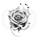 A mesmerizing black-grey tattoo of a rose intertwined with a delicate rosary, symbolizing the client's devotion to their faith tattoo design idea