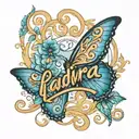 the name Yadira in cursive with blue butterfly's around it tattoo design idea