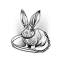 rabbit tied to ball and chain tattoo design idea