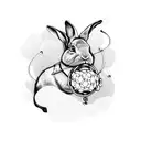 rabbit tied to ball and chain tattoo design idea