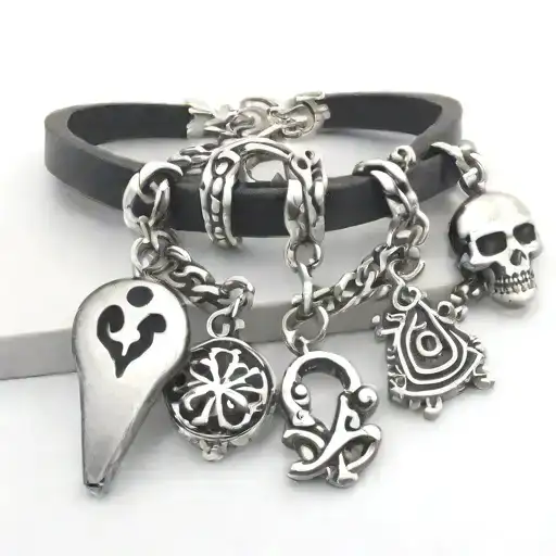 bracelet with charms hanging tattoo design idea