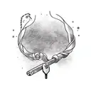 A minimalist tattoo of a wand from Harry Potter entwined with a gaming controller tattoo design idea