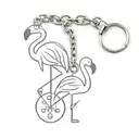 flamingo and dice keychain hanging tattoo design idea