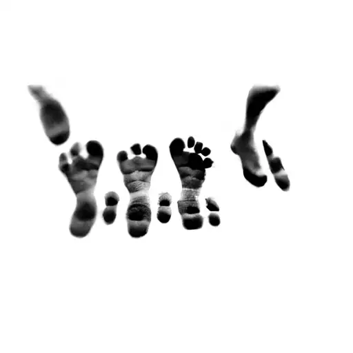 a baby's footprints tattoo design idea