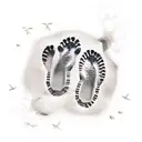 footprints in the sand with burning ship in the backround tattoo design idea