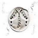 footprints in the sand with burning ship in the backround tattoo design idea