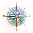 A realistic compass surrounded by colorful tropical flowers tattoo design idea