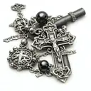 cross and rosary with the name antonio gomez tattoo design idea