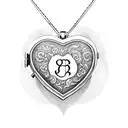 A heart-shaped locket with the initials of Vincent, Timmira, and Cadence inside tattoo design idea