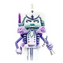 Nutcracker in a purple and green crochet design tattoo design idea